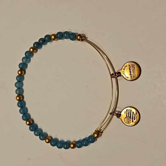 ALEX AND ANI Green & Goldtone Beads on 2 3/8" to 3"Dia. Goldtone Wire Bracelet - Picture 1 of 6